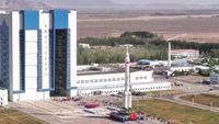 The Long March 2F rocket for China's Shenzhou 23 astronaut mission rolls out to the launch pad on May 16, 2026.