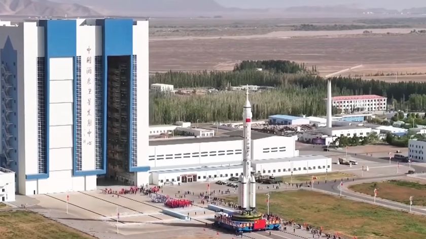 The Long March 2F rocket for China's Shenzhou 23 astronaut mission rolls out to the launch pad on May 16, 2026.