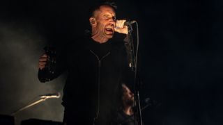 SPAIN - JULY 12: Nine Inch Nails (NIN) will perform on the second day of Mad Cool 2025 at the Iberdrola Music venue on July 11, 2025 in Madrid, Spain. Today's performance at Mad Cool of the historic American industrial rock band has been one of the most anticipated moments of the international event, during which they have flaunted their powerful live show and new songs. The festival, which kicked off yesterday, brings together legends and new promises in four days of music, consolidating itself as an essential event of the European summer. (Photo By Ricardo Rubio/Europa Press via Getty Images)