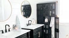 Bathroom Renovation after photo - shiplap walls, black vanities