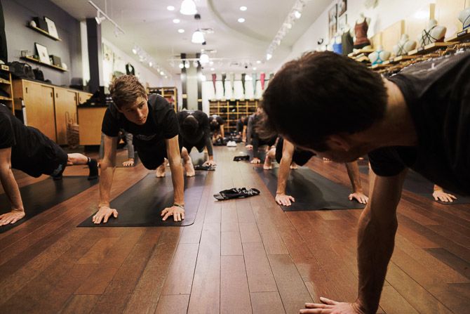 Edward Anderson (left) and the Axeon Hagens Berman Cycling Team started training camp days with yoga sessions by lululemon athletica ambassador Ted McDonald (right)