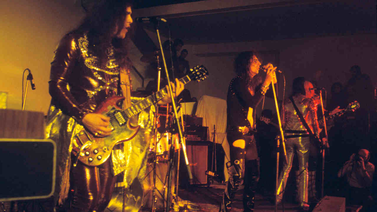 The Alice Cooper band performing onstage in the early 1970s