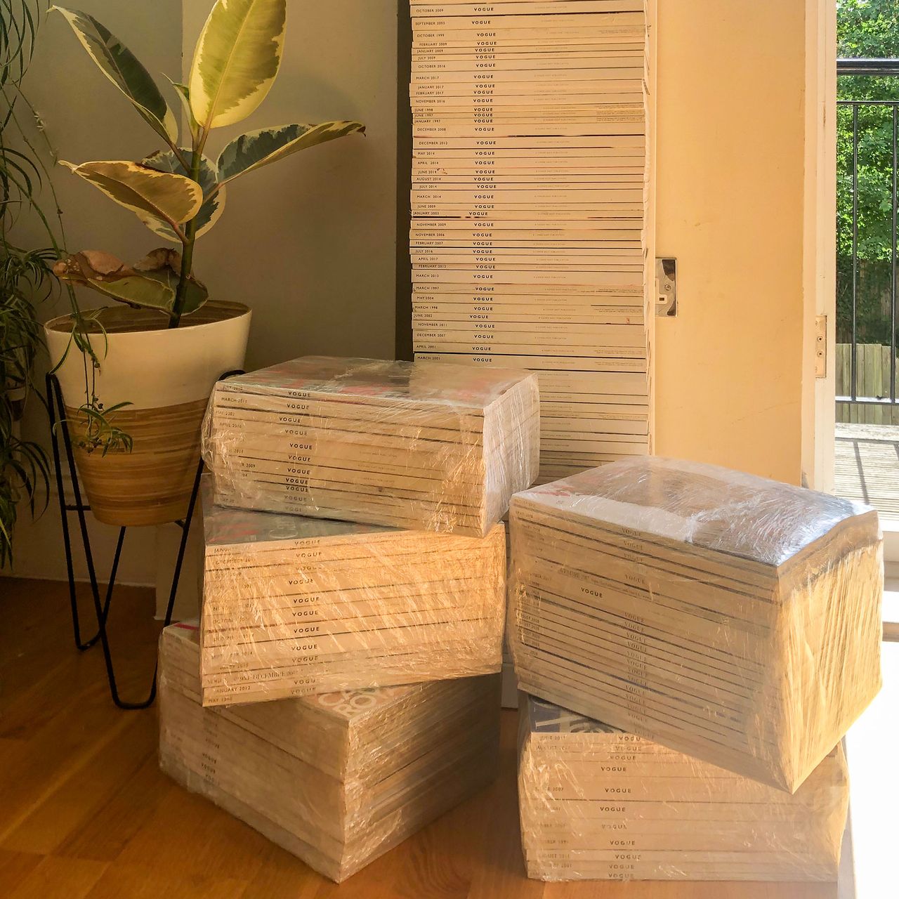 Stacks of magazines wrapped up in plastic