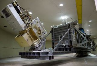 NASA technicians spun the Global Precipitation Monitor (GPM) satellite up to just over 10 RPM in Goddard Space Flight Center’s High-Capacity Centrifuge facility March 31, 2011. At that speed, the spin exerted a lateral pressure of 2.4 G’s, or 2.4 times the force of gravity on the satellite.