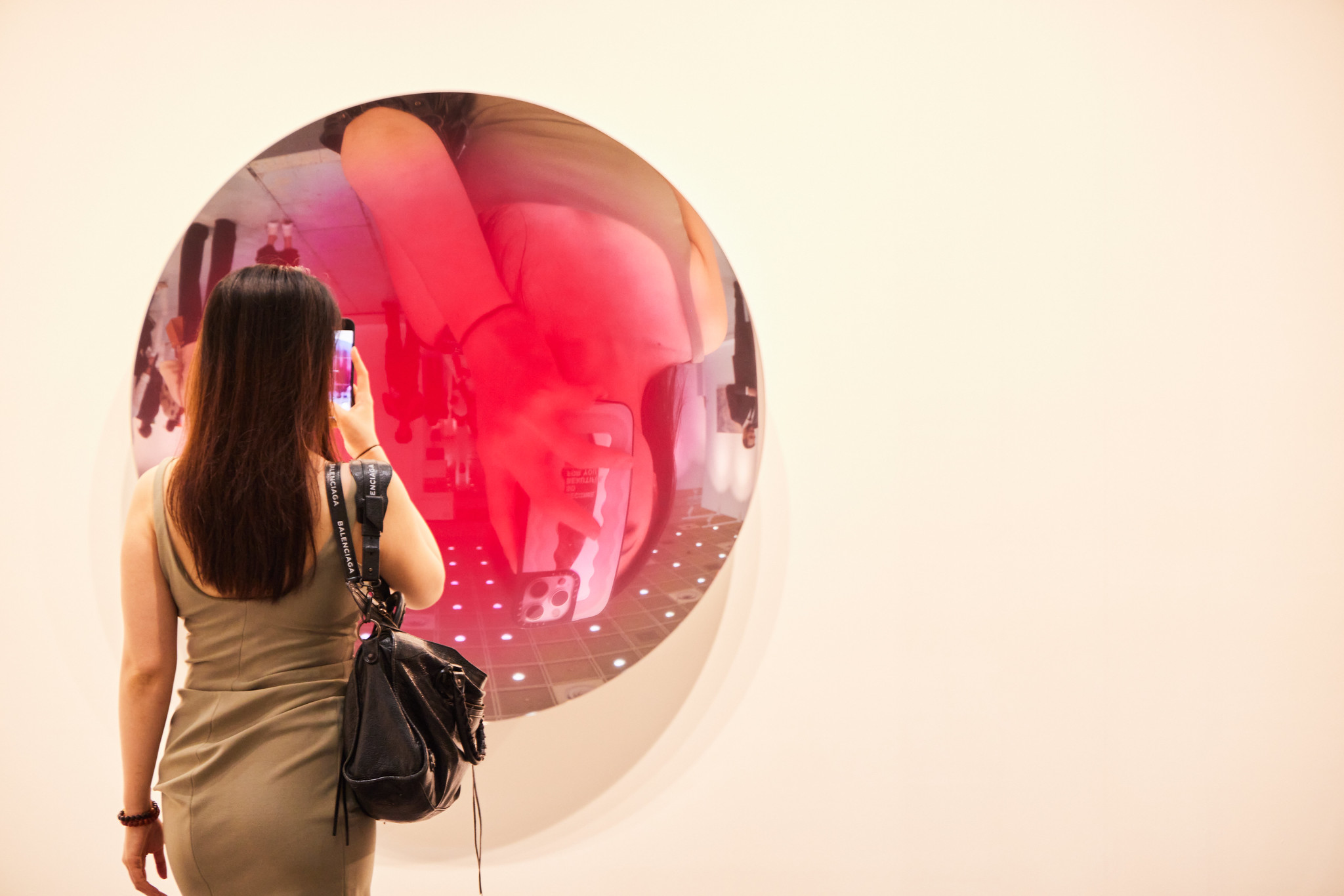 woman looking at art