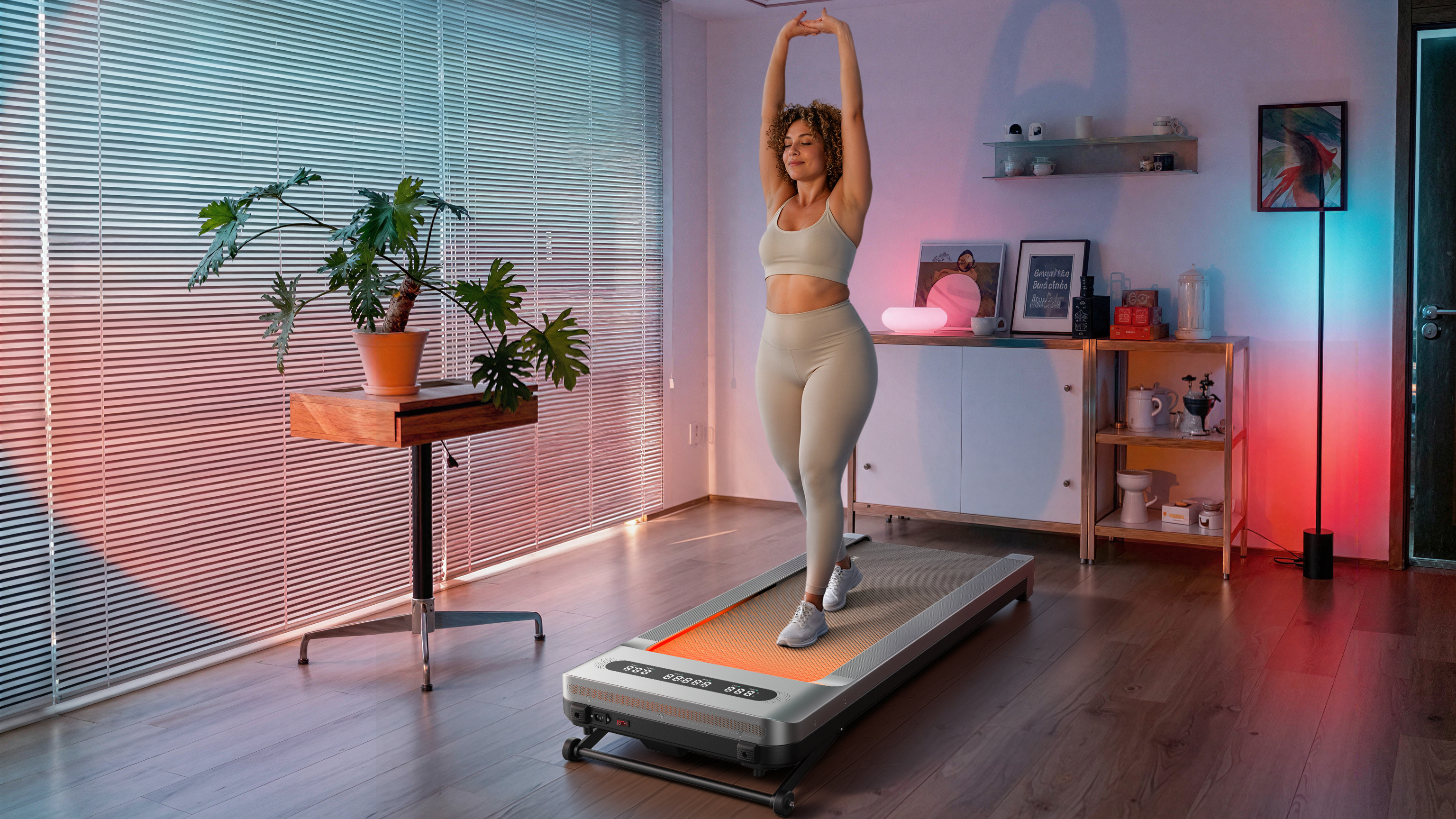 Woman walks on walking pad in domestic setting
