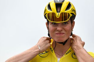 Team SD Worx - Protime's Dutch rider Demi Vollering, wearing the overall leader yellow jersey, looks on prior to the 5th stage (out of 8) of the third edition of the Women's Tour de France cycling race, a 152.5 km between Bastogne in southeastern Belgium and Amneville in northeastern France, on August 15, 2024. (Photo by JULIEN DE ROSA / AFP)