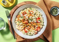 Kikerter og kremet perlecouscous med ovnsbakte cherrytomater og gresk salatost