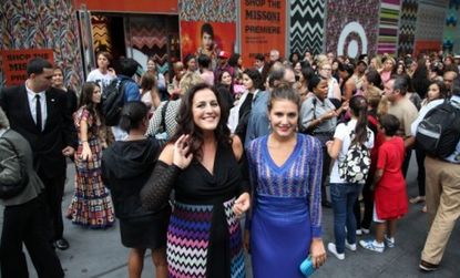 Missoni designers stand in front of the massive crowd that awaits entrance into the New York Missoni for Target temporary store.