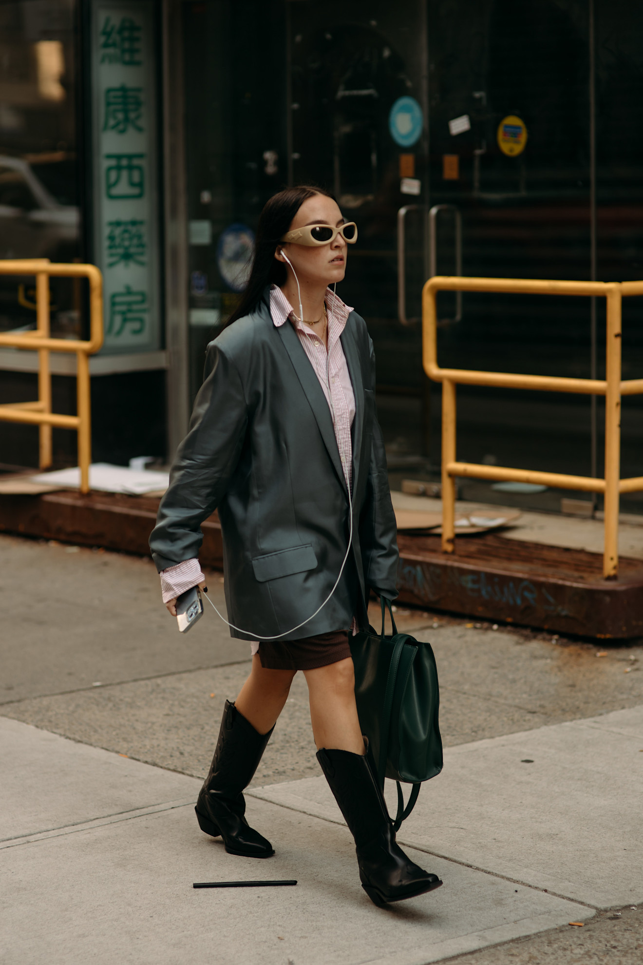 fashion week attendee wearing fall shoe trends to spring summer 2026 fashion week