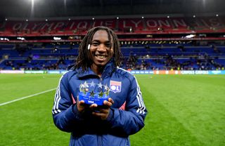 Melchie Dumornay of Olympique Lyonnais poses for a photo with the VISA Player Of The Match award after the UEFA Women's Champions League 2023/24 semi-final Leg One match between Olympique Lyonnais and Paris Saint-Germain at OL Stadium on April 20, 2024 in Lyon, France.