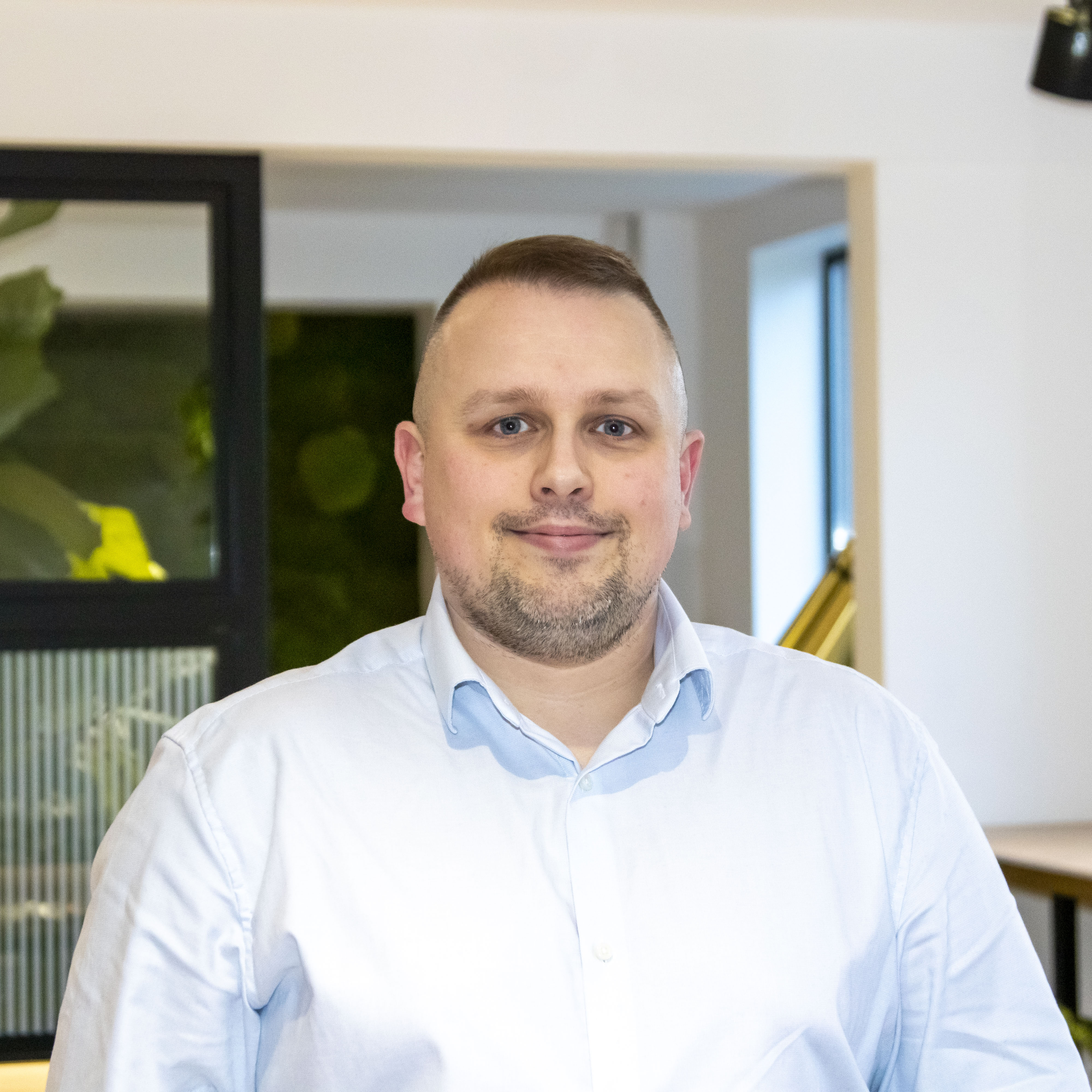 An expert headshot of Richard Eaton, Senior Design Manager at Tissino