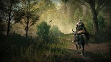 A knight on horseback walks through a lush, green forest
