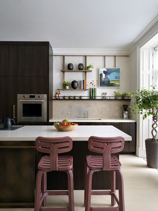 Modern kitchen with dark pink vintage island seating