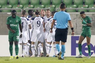 Harry Kane, centre, is congratulated by his Spurs team-mates after he reached 200 goals for the club with a header in the 3-1 win at Ludogorets