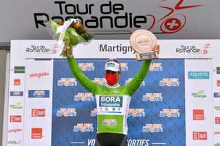 MARTIGNY SWITZERLAND APRIL 28 Peter Sagan of Slovakia and Team Bora Hansgrohe Green Points Jersey celebrates at podium during the 74th Tour De Romandie 2021 Stage 1 a 1681km stage from Aigle to Martigny Trophy Mask Covid safety measures Flowers TDR2021 TDRnonstop UCIworldtour on April 28 2021 in Martigny Switzerland Photo by Luc ClaessenGetty Images