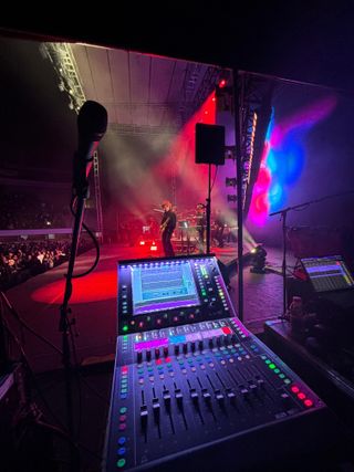 The unobtrusive rectangular silhouette of the RF Venue CP Stage antenna shown on its mic stand mount between the monitor mixer and the performers on stage at Tijuana’s Monumental Plaza de Toros where it delivered 18-channels of wireless IEMs during artist Siddharta’s performance.