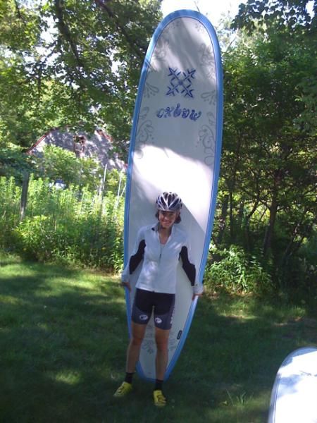 Mary with a paddle board.