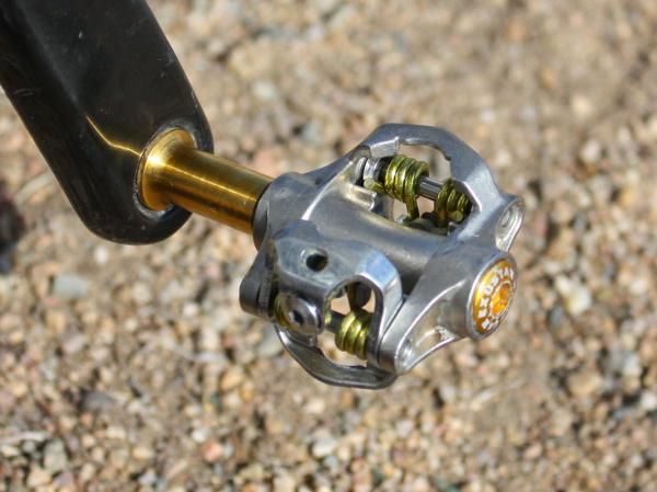 A cast titanium body with integrated bails and titanium spindles help keep the claimed weight of Parbo's Exustar pedals to just 120g per pair.