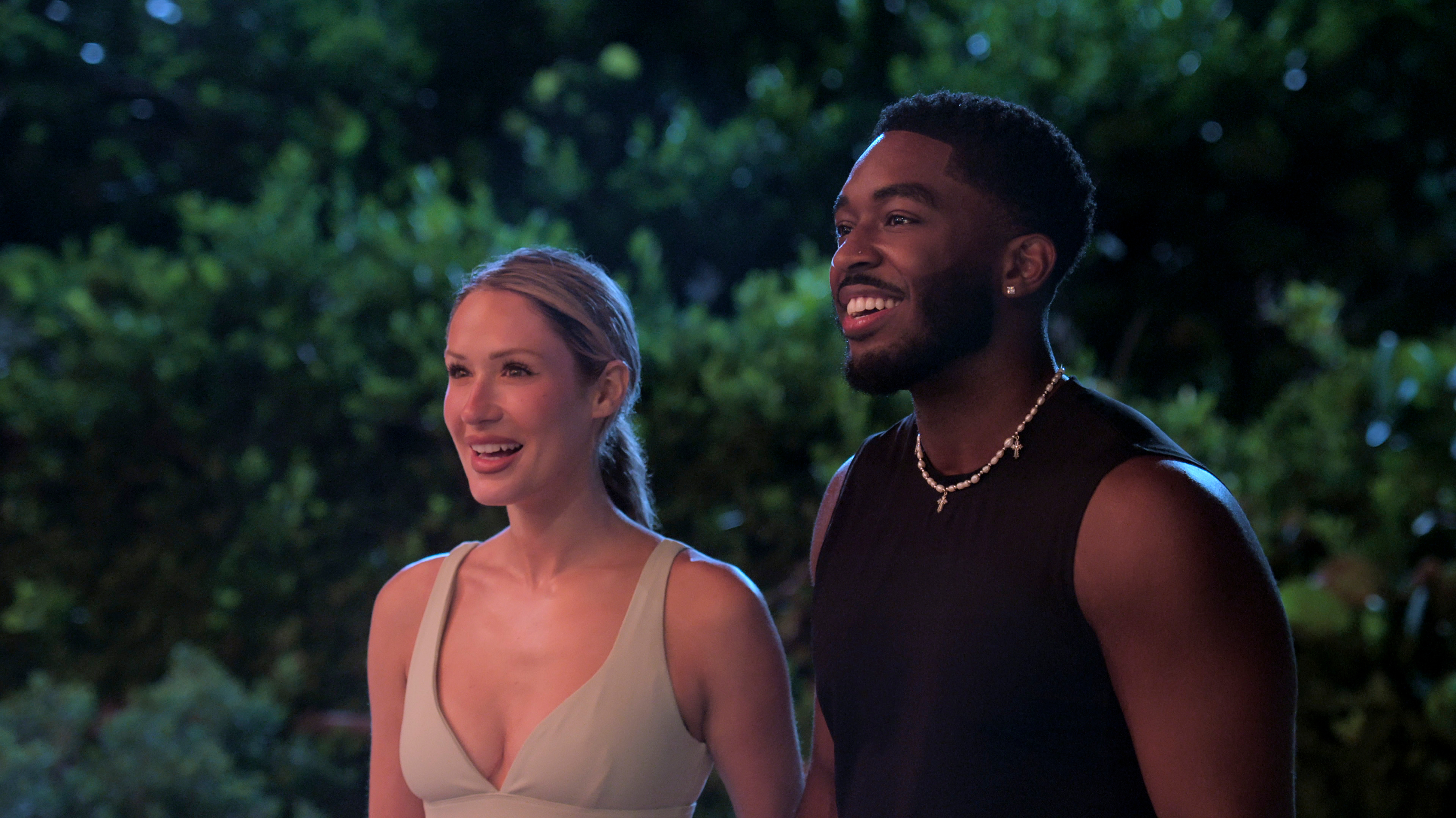 Rachel Recchia and Ray Gantt stand smiling together in episode 309 of Perfect Match.