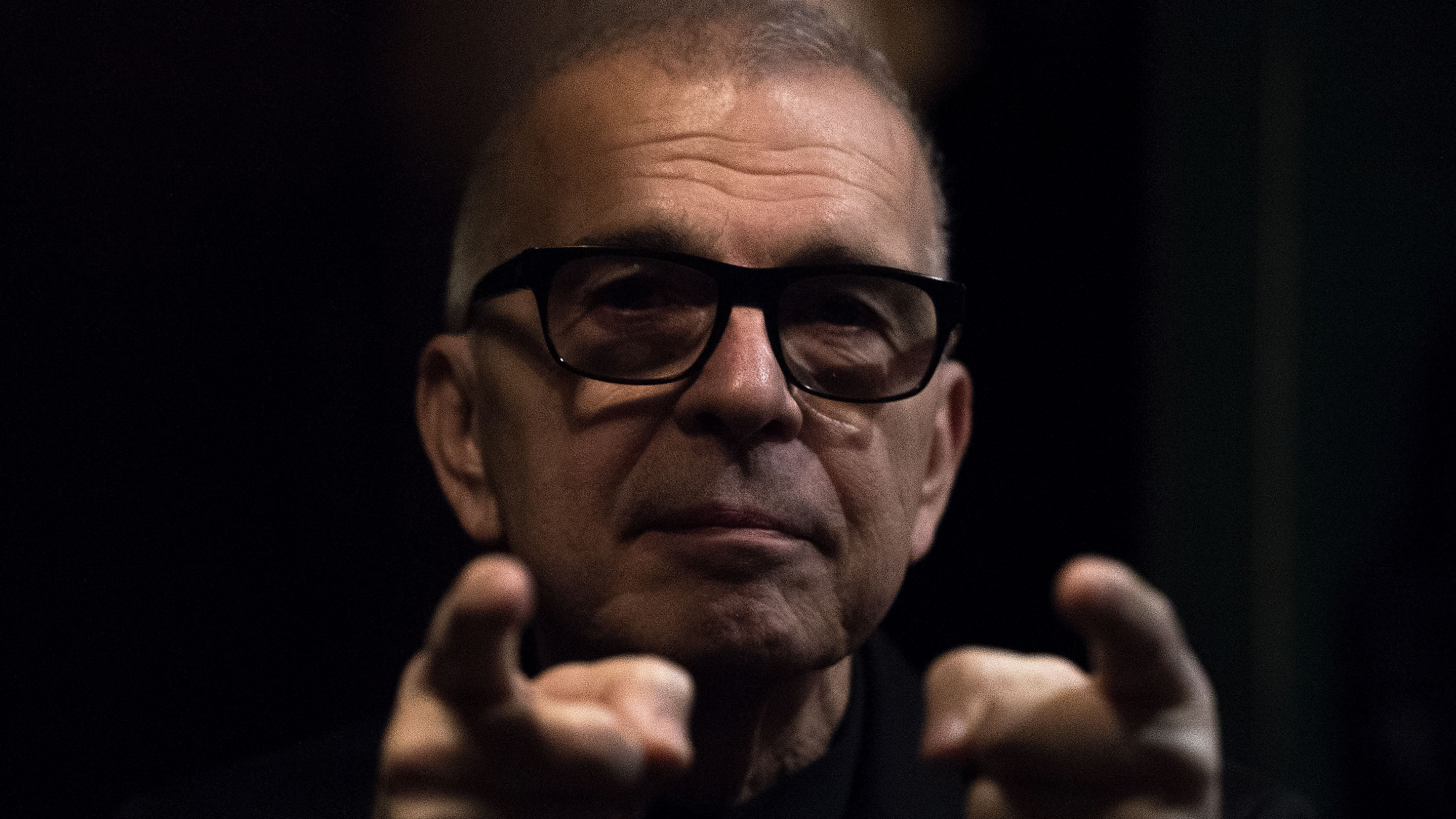 American historic producer of British singer David Bowie, Tony Visconti, poses during a photo session in Paris on November 19, 2019