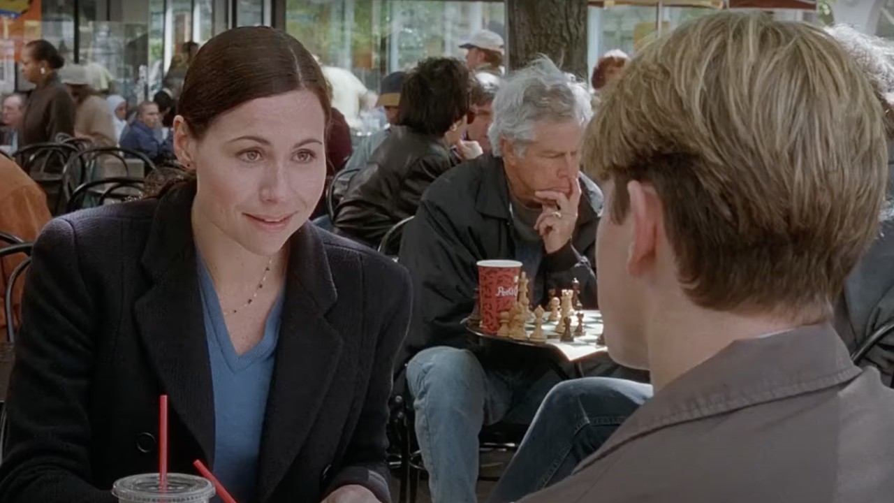 Minnie Driver in Good Will Hunting talking to Matt Damon with her eye brows raised.