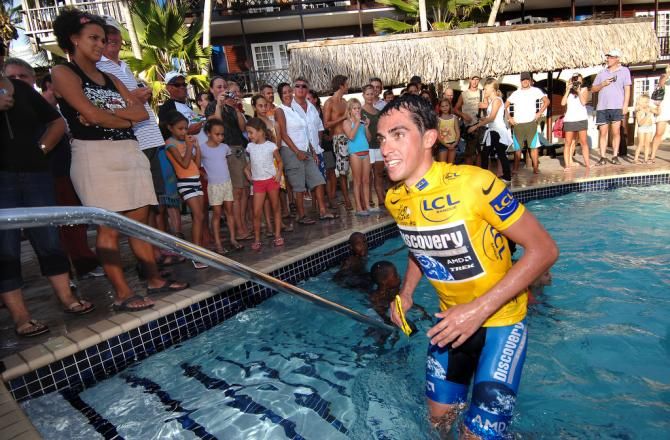 Alberto Contador goes for a swim in hie 2007 yellow jersey