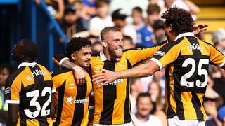 Mohamed Belloumi of Hull City celebrates their second goal with Nobel Mendy, Ollie McBurnie and Matt Crooks.