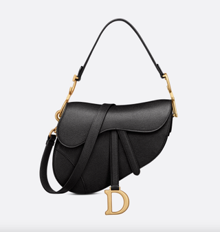 a black Dior saddle bag