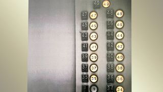 A detail from a print advert for Lowe Lintas & Partners showing a lift with all of the buttons pressed