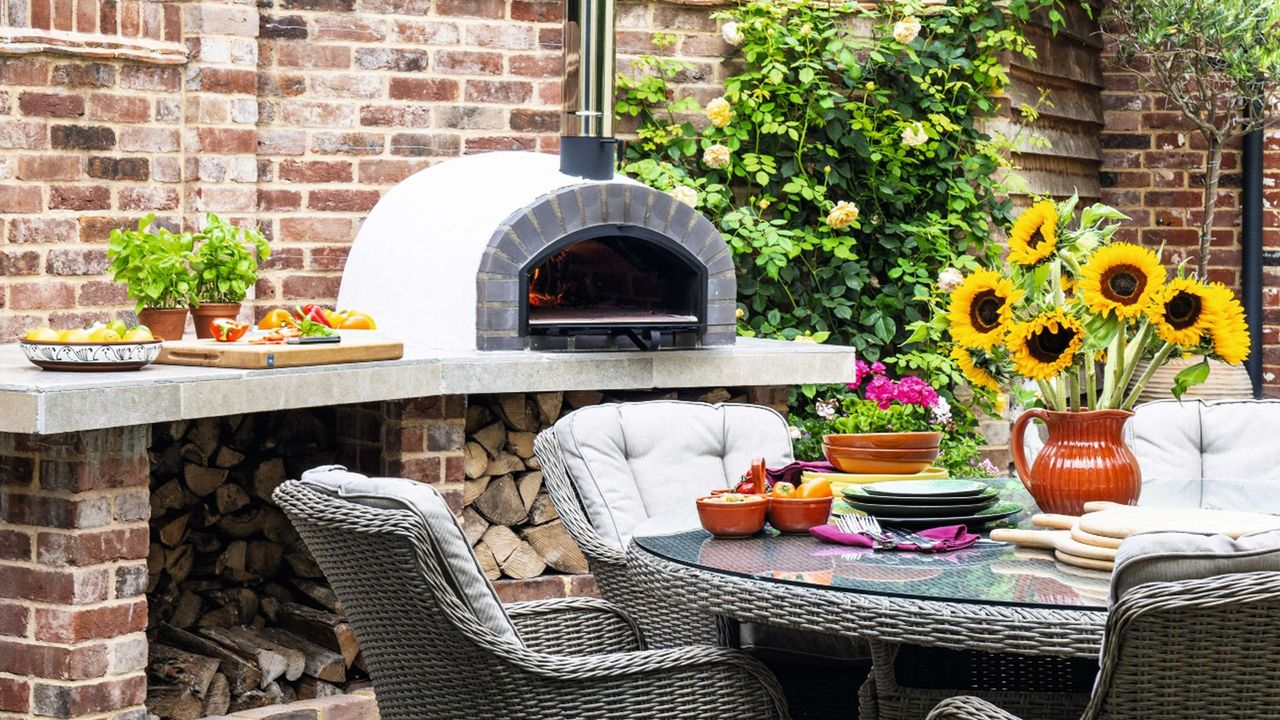 Outdoor pizza oven and dining table