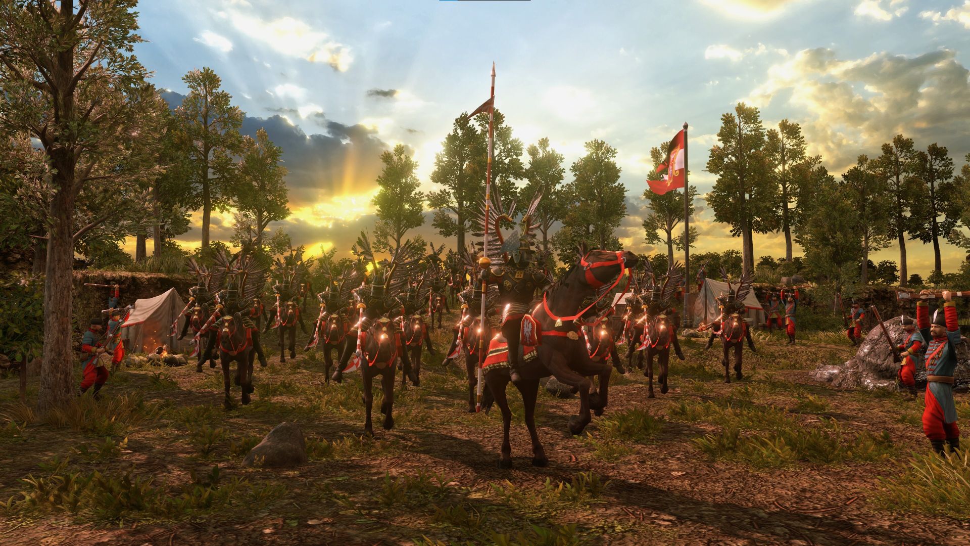 Screenshot from Age of Empires 3: Definitive Edition's Baltic Powers DLC, showing an army on horseback riding through a forest during sunset.
