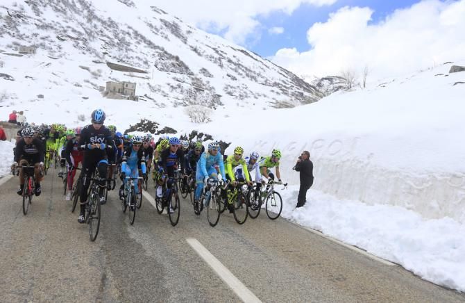 The peloton tapped out a gentle pace at the start of stage 14
