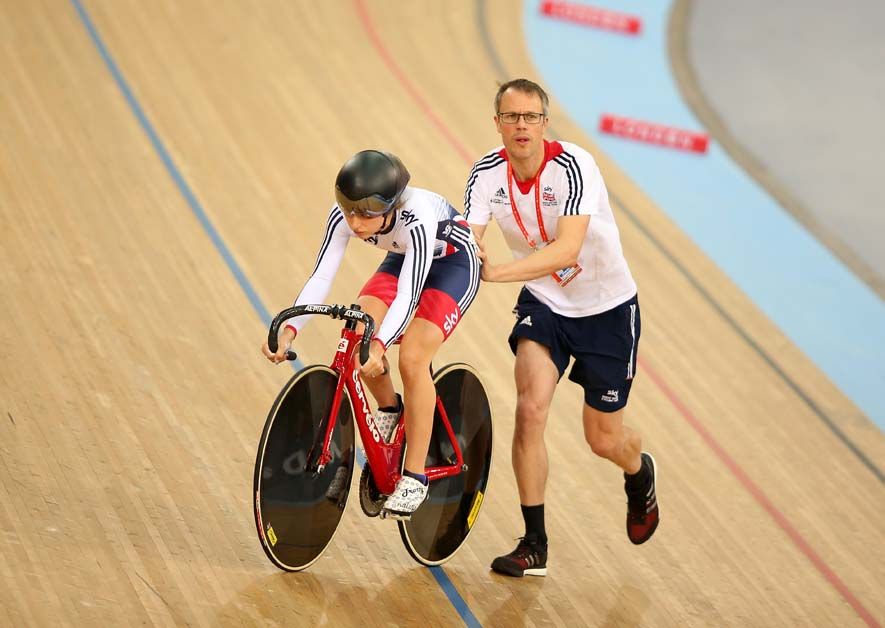 Laura Trott gets a push from her coach Paul Manning