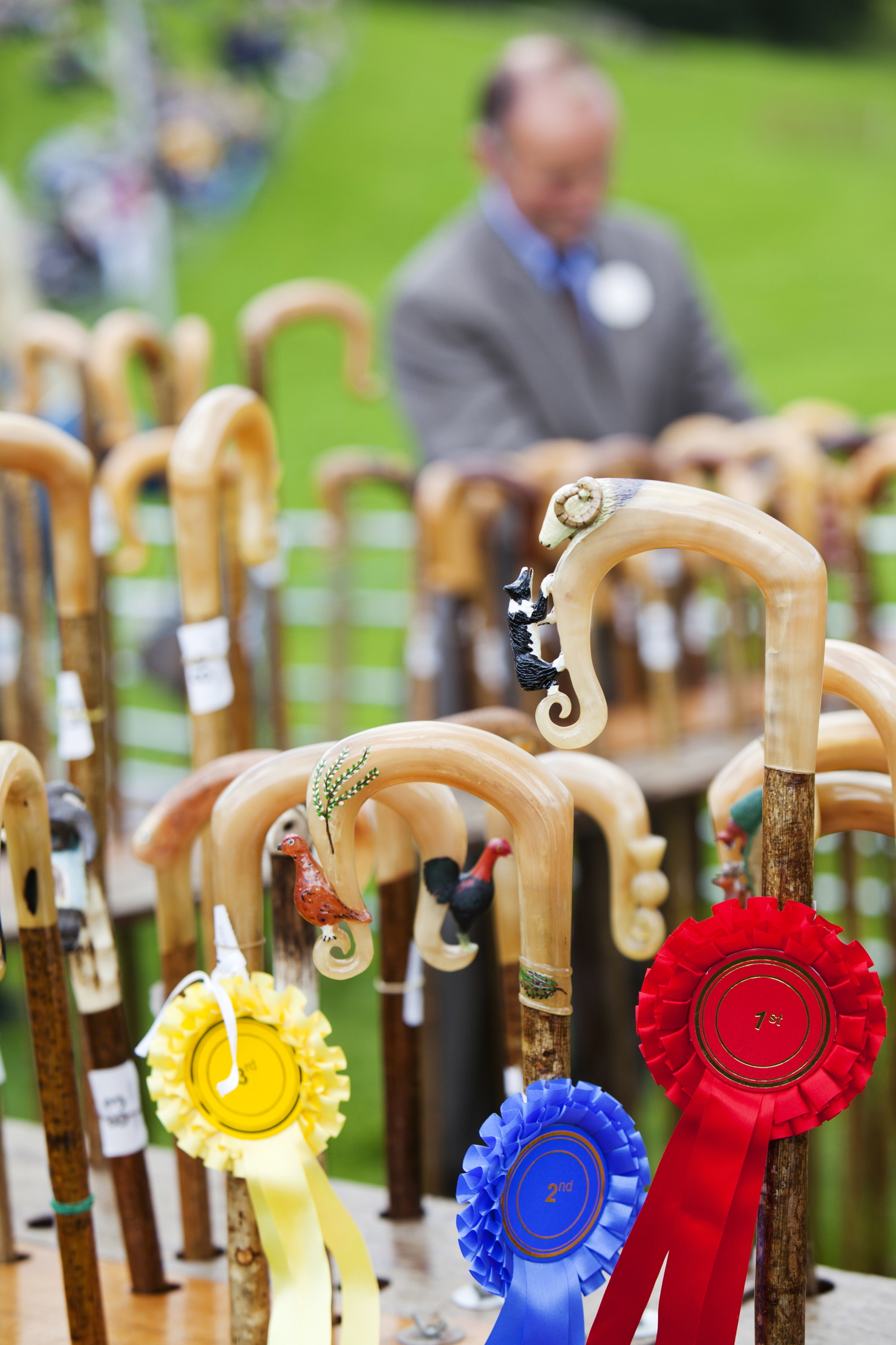 Judging the shepherds crooks at the Vale of Rydal Sheepdog Trials, Ambleside, Lake District, UK.