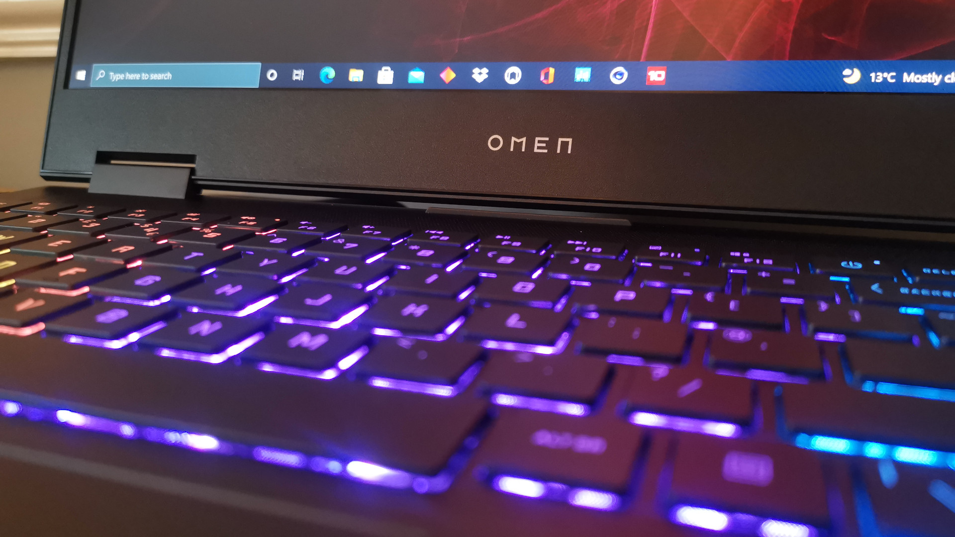 A close up of the HP Omen 15 logo on the display