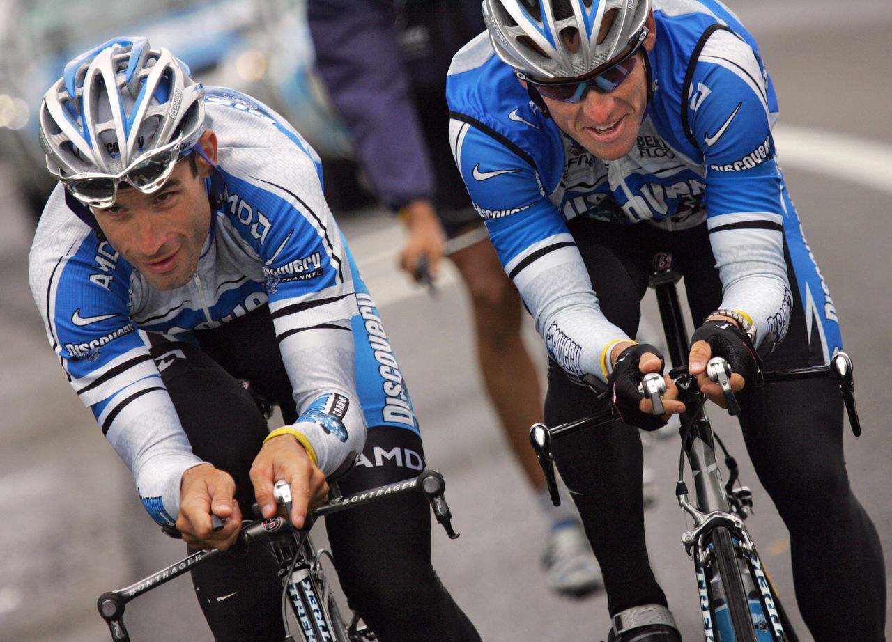Lance Armstrong and George Hincapie ride together during a stage of the 2005 Tour de France