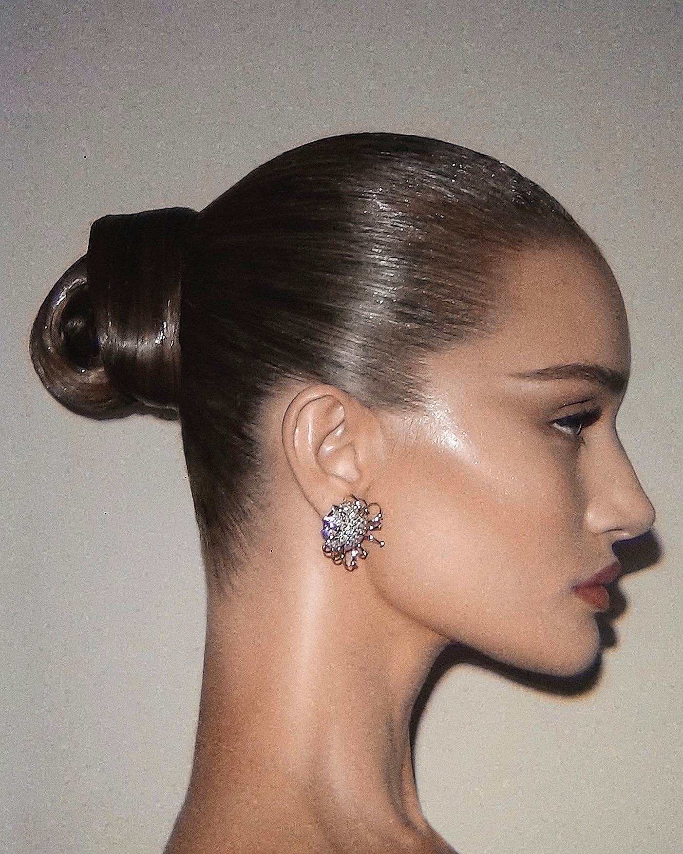 Rosie Huntington-Whiteley with twisted wrapepd bun