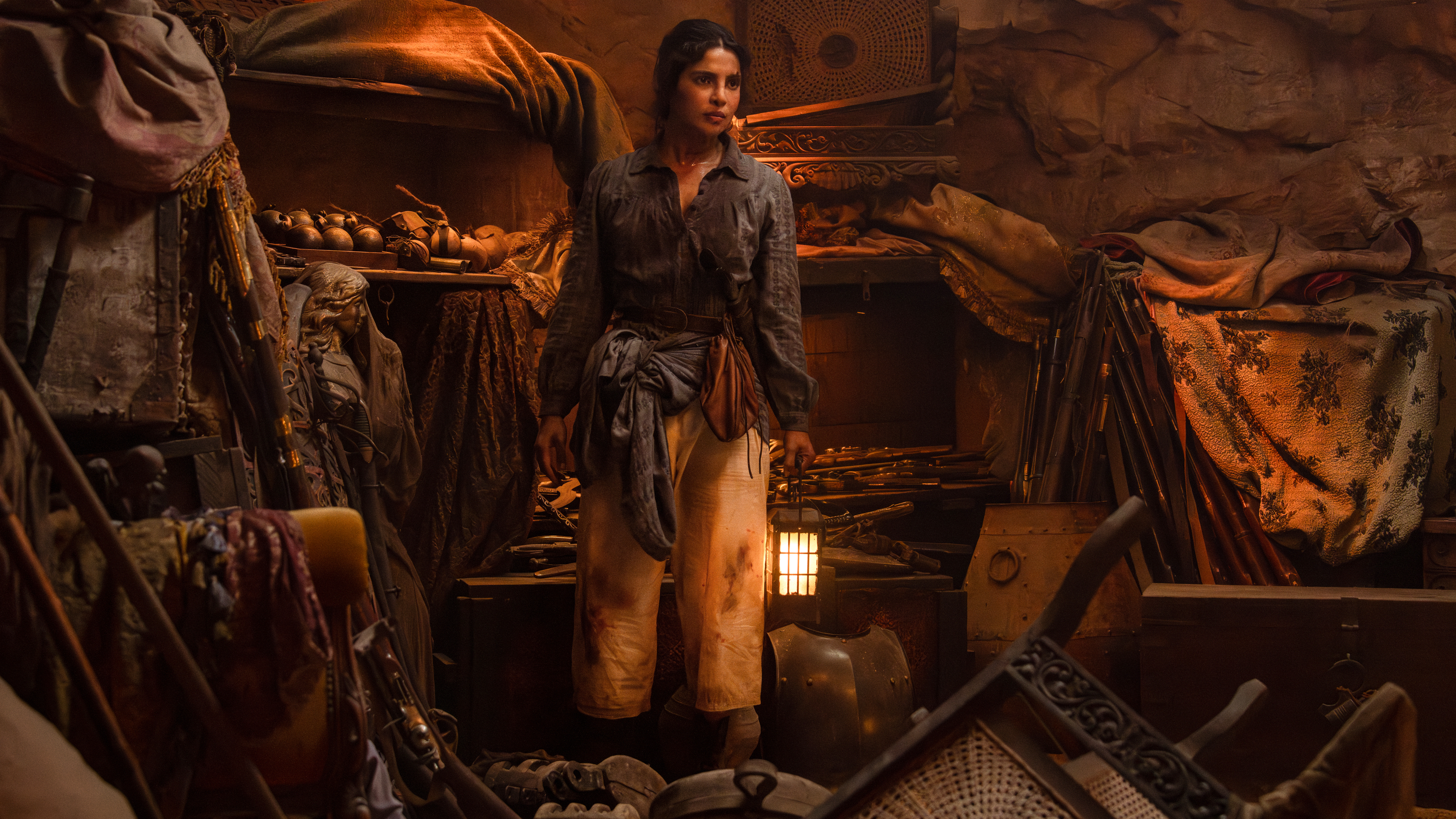 Priyanka Chopra Jonas surrounded by pirate gear in a scene from Prime Video's &amp;quot;The Bluff&amp;quot;