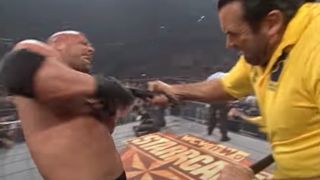 Scott Hall tasing Goldberg at Starrcade '98