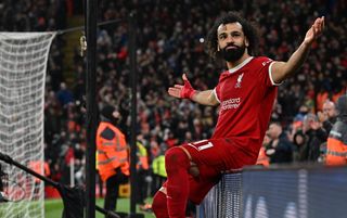 Mohamed Salah enjoys the acclaim of the crowd after scoring against Newcastle United