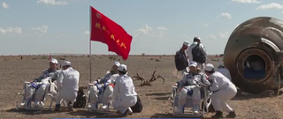 The three-person crew of Shenzhou 12 - Nie Haisheng, Liu Boming and Tang Hongbo - are seen after exiting their Shenzhou capsule after landing in n the Gobi Desert in Inner Mongolia on Sept. 17, 2021 to end a 90-day mission to China's Tianhe module, the first piece of the Tiangong space station. 