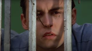 Johnny Depp cries a single tear behind bars in Cry Baby.
