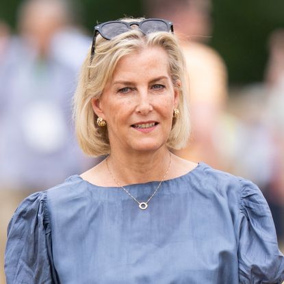 Duchess Sophie wearing a blue top and smiling