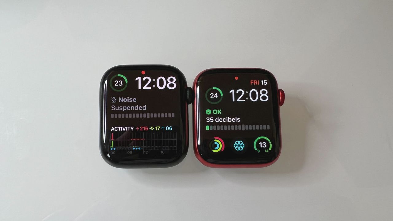 An Apple Watch 7 (45mm) on the left and an Apple Watch 6 (44mm) on the right