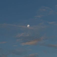 The moon in the sky, a sound bath, and a woman stretching