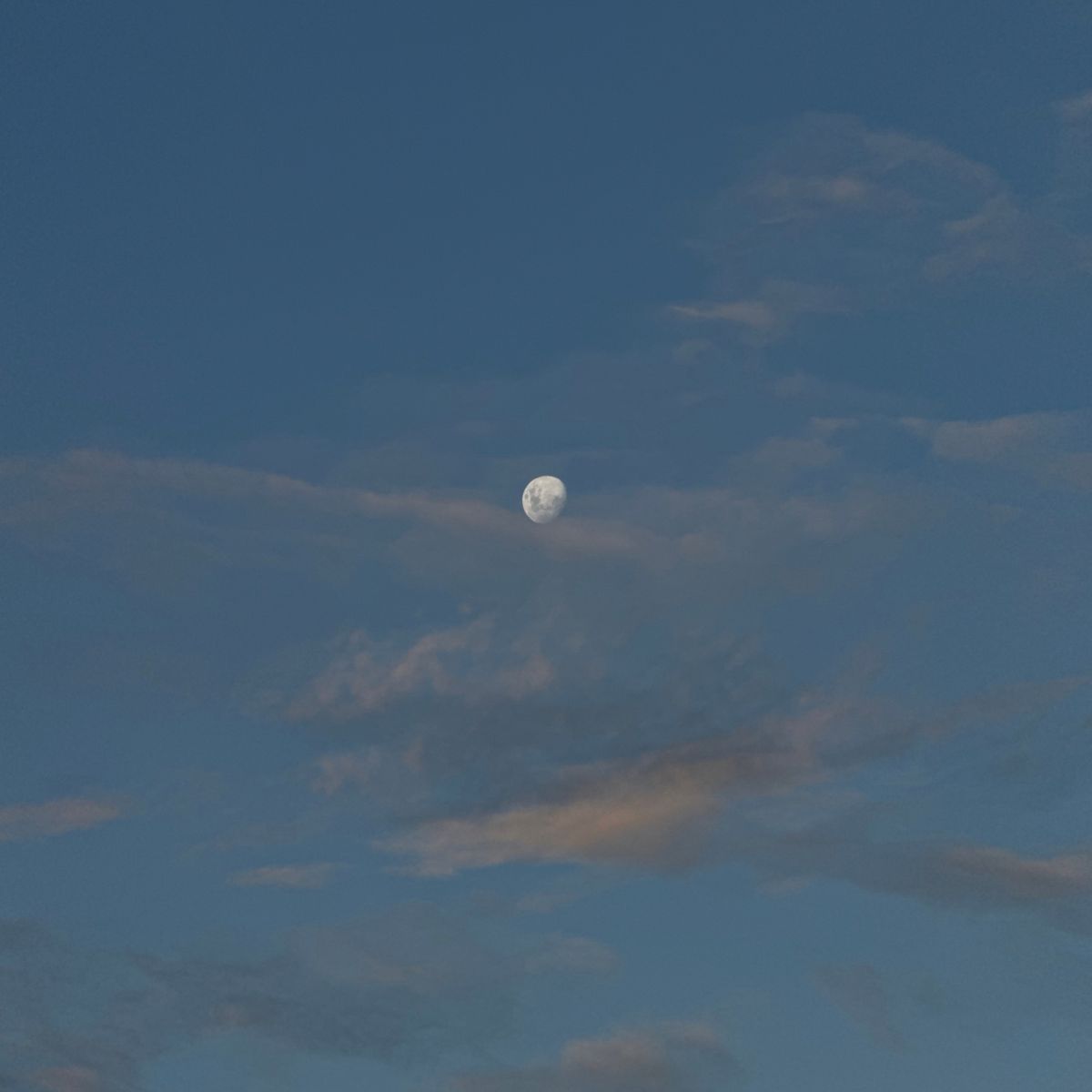 The moon in the sky, a sound bath, and a woman stretching