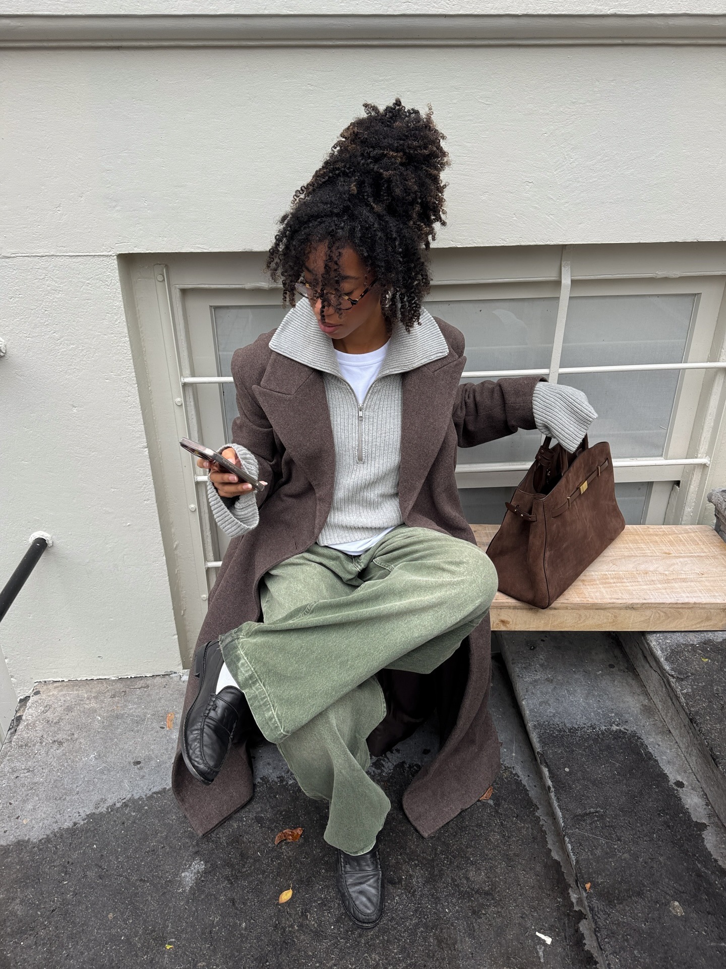 Woman wearing fall outfit with loafers.