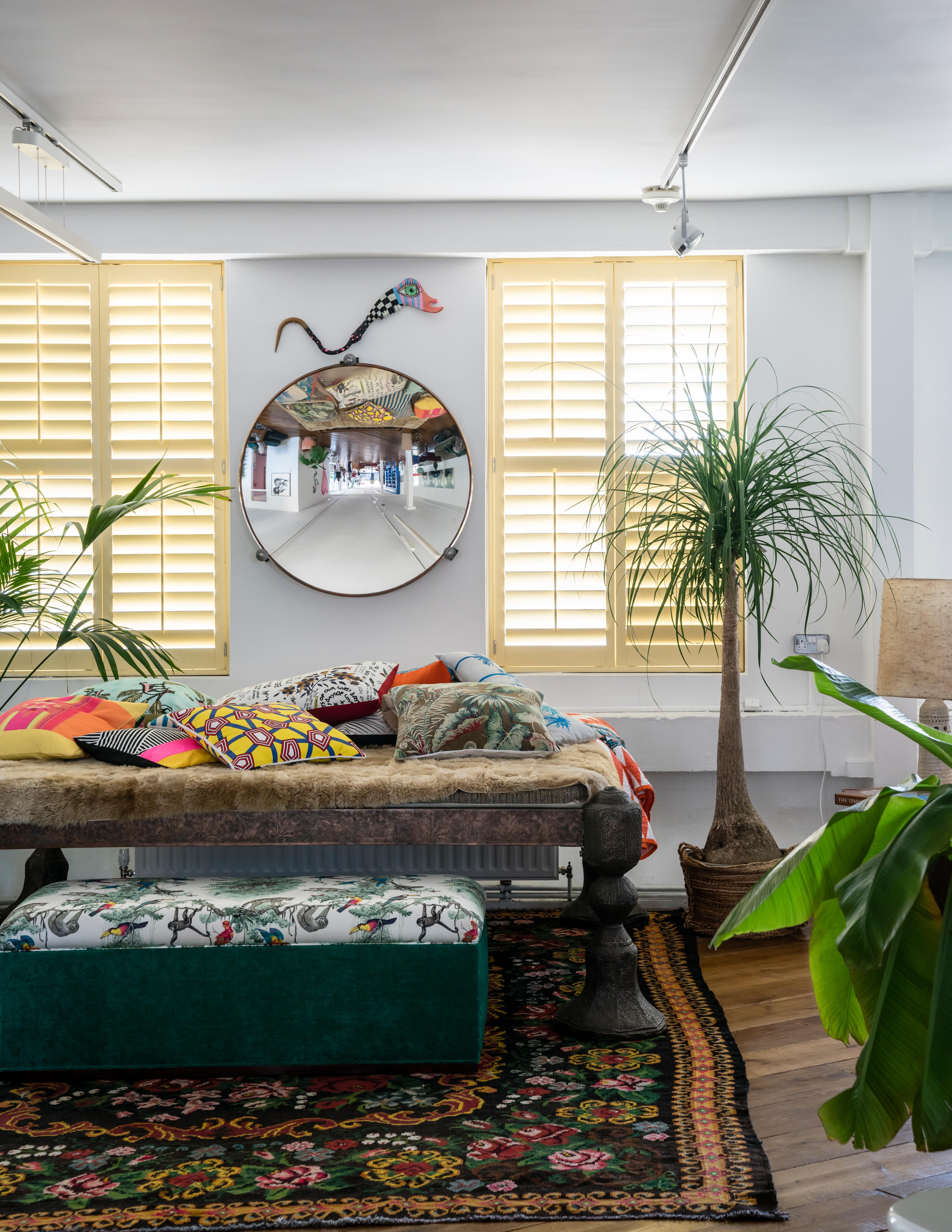 Living room with yellow shutters