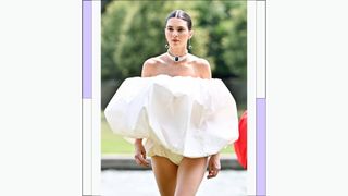 Kendall Jenner wears a cloud-like white mini dress as she walks the runway during "Le Chouchou" Jacquemus' Fashion Show at Chateau de Versailles on June 26, 2023 in Versailles, France.